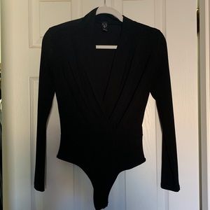 Plunge neck long sleeve body suit